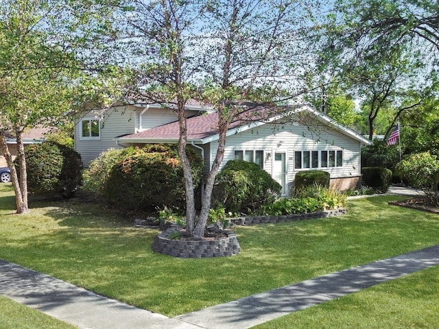 view of property exterior with a yard