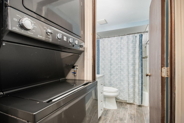 full bathroom featuring hardwood / wood-style flooring, vanity, toilet, and shower / bath combo with shower curtain