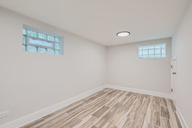 spare room with light hardwood / wood-style floors