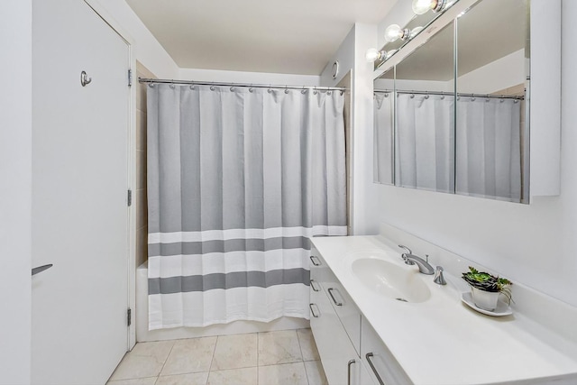 bathroom featuring vanity, tile patterned floors, and a shower with curtain