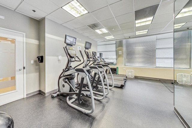 workout area with a drop ceiling