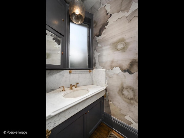 bathroom featuring visible vents and vanity