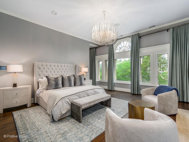 bedroom featuring crown molding, dark wood-type flooring, and a notable chandelier