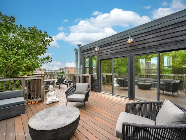 deck with an outdoor hangout area