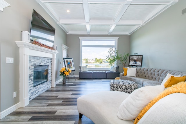 living room featuring beamed ceiling, dark wood-type flooring, coffered ceiling, and a fireplace