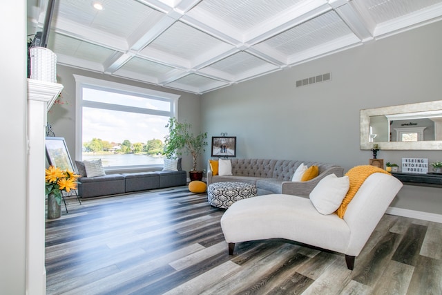 living room featuring coffered ceiling, beam ceiling, and hardwood / wood-style floors