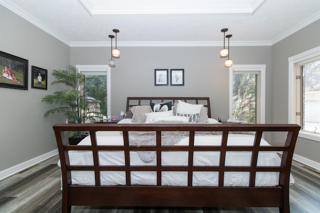 bedroom with ornamental molding and hardwood / wood-style flooring