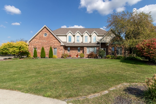 view of front of home with a front lawn