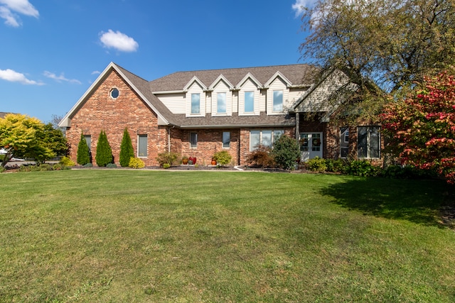 view of front facade with a front yard