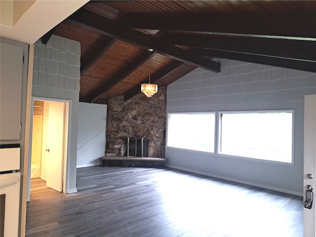 unfurnished living room featuring a stone fireplace, vaulted ceiling with beams, hardwood / wood-style flooring, and wood ceiling