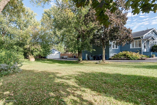 view of yard with a garage