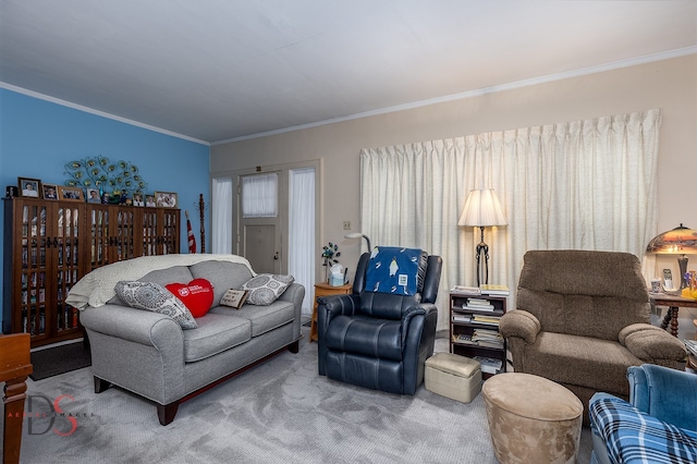 living room with ornamental molding and carpet flooring