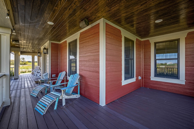 wooden deck featuring covered porch