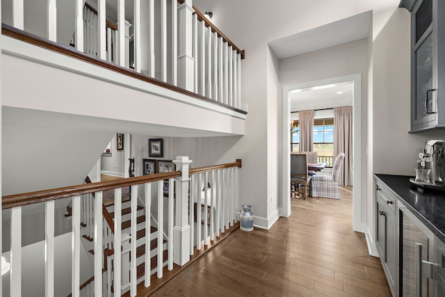 hallway featuring dark hardwood / wood-style floors