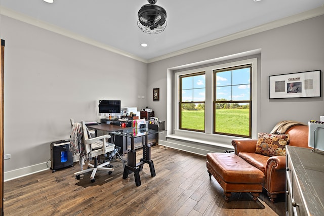 office area with dark wood-type flooring and ornamental molding