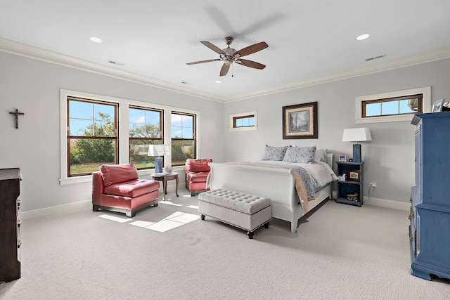 carpeted bedroom featuring multiple windows, crown molding, and ceiling fan