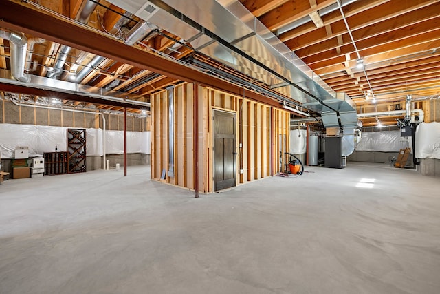 basement featuring gas water heater