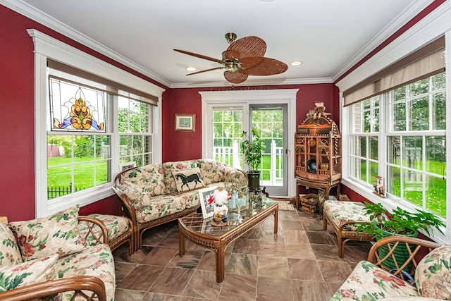 sunroom / solarium with ceiling fan