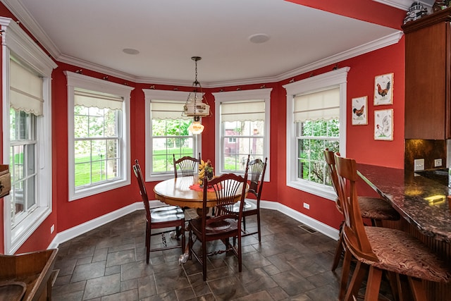 dining room with ornamental molding