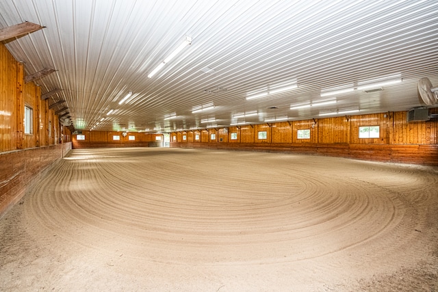 view of horse barn featuring an AC wall unit