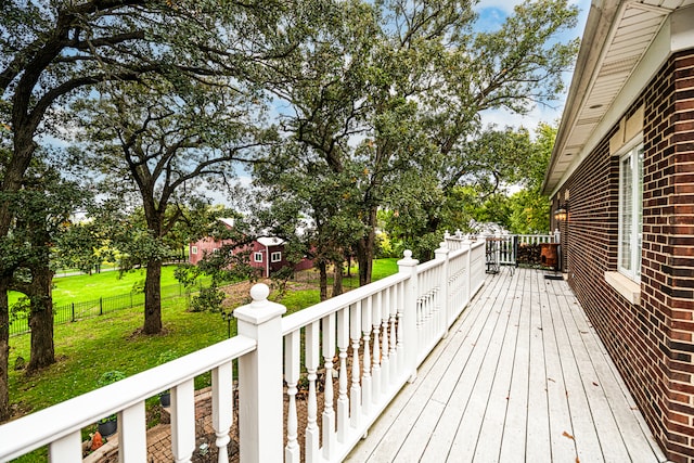 deck featuring a yard