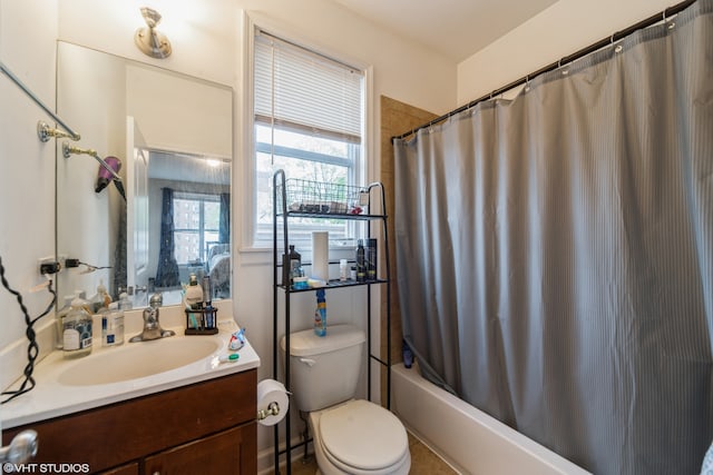 full bathroom with shower / bath combo, vanity, and toilet