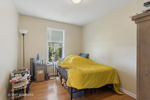 bedroom featuring hardwood / wood-style flooring