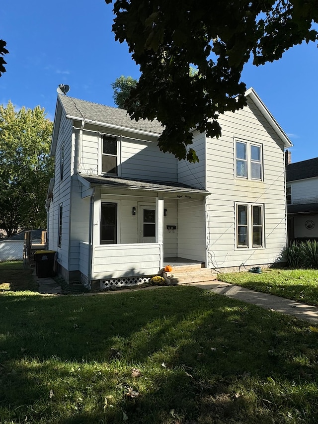 front of property with a front lawn