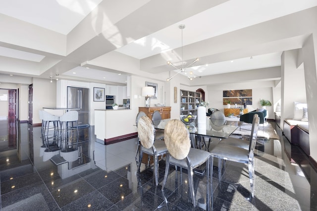 dining room with a notable chandelier