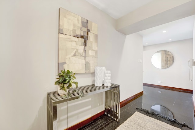 interior space featuring dark tile patterned floors