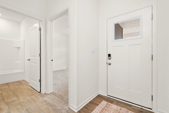 entrance foyer with light wood-type flooring