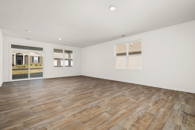 unfurnished living room featuring light wood-type flooring