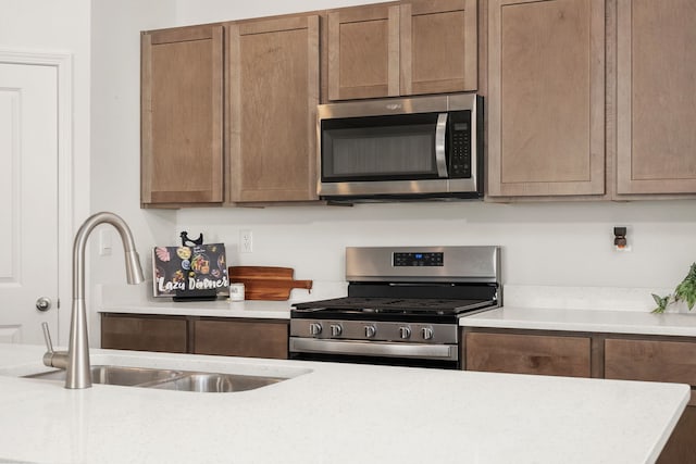 kitchen with stainless steel appliances and sink