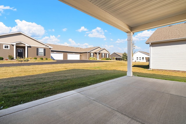 view of patio with a garage