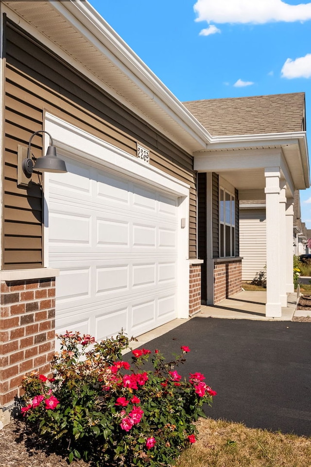 exterior space with a garage