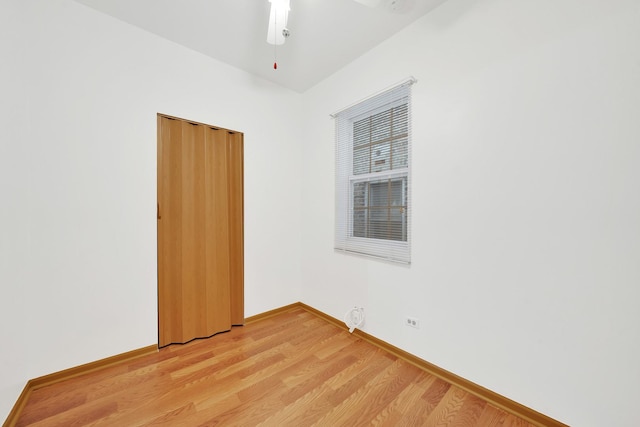 spare room featuring light wood-type flooring