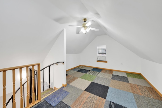 bonus room featuring vaulted ceiling, ceiling fan, and carpet flooring