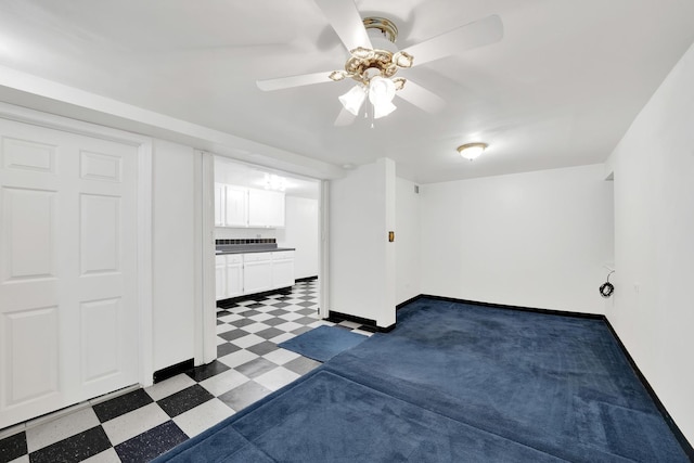 unfurnished room featuring ceiling fan