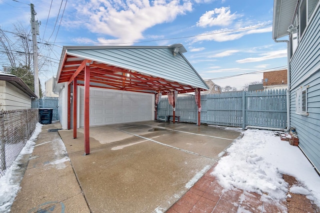 exterior space with a garage and a carport