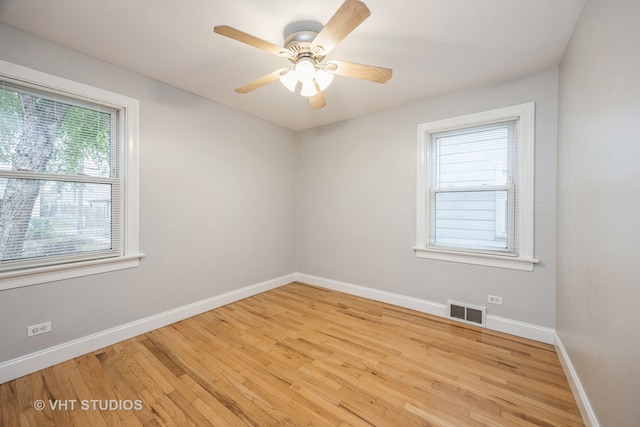 unfurnished room with light hardwood / wood-style floors and ceiling fan