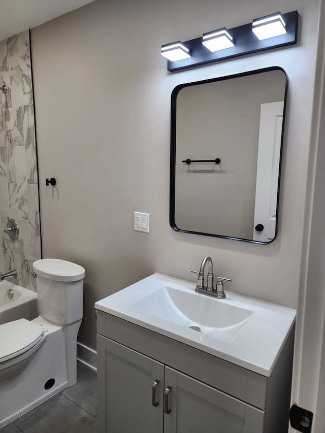 full bathroom with shower / bathing tub combination, tile patterned flooring, vanity, and toilet