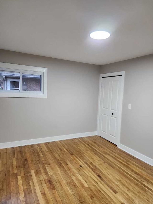 basement featuring light hardwood / wood-style flooring