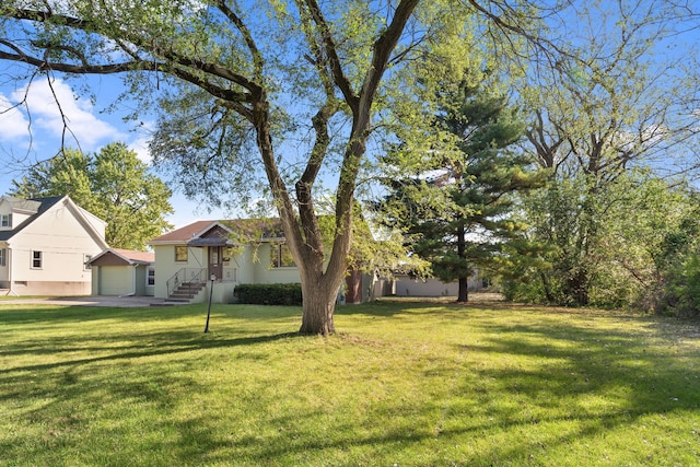 view of yard featuring a garage