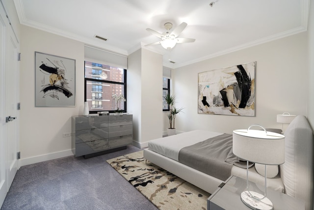 carpeted bedroom with ornamental molding and ceiling fan