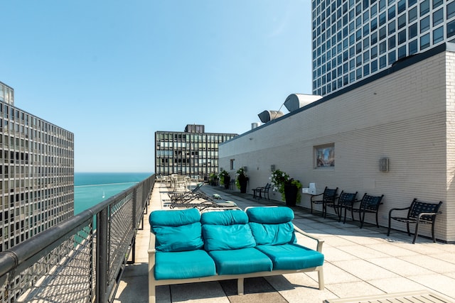 exterior space featuring a water view and an outdoor hangout area