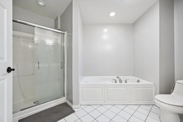 bathroom featuring independent shower and bath, tile patterned flooring, and toilet