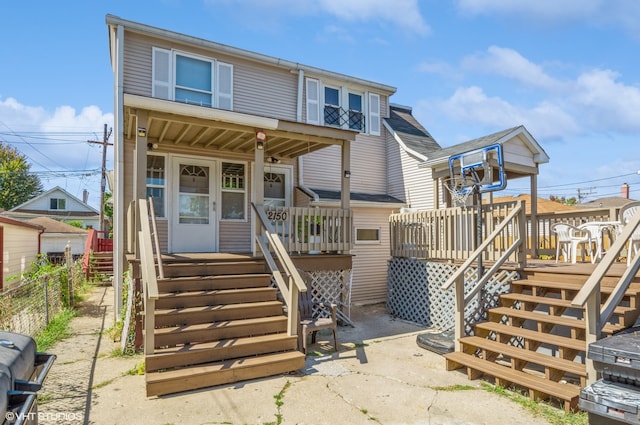 view of front of house with a wooden deck