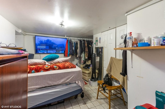 bedroom featuring tile patterned flooring