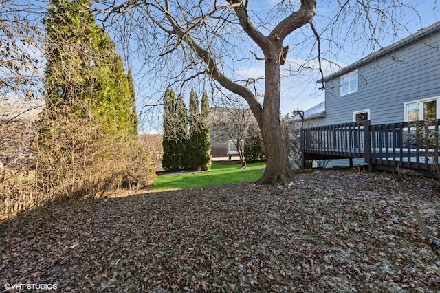 view of yard with a deck