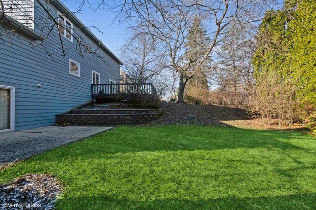 5042 Boulders Dr, Gurnee, IL 60031 - view of grassy yard featuring a deck